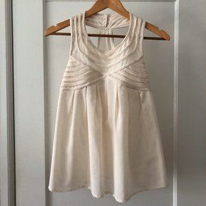 Off white top with unique details